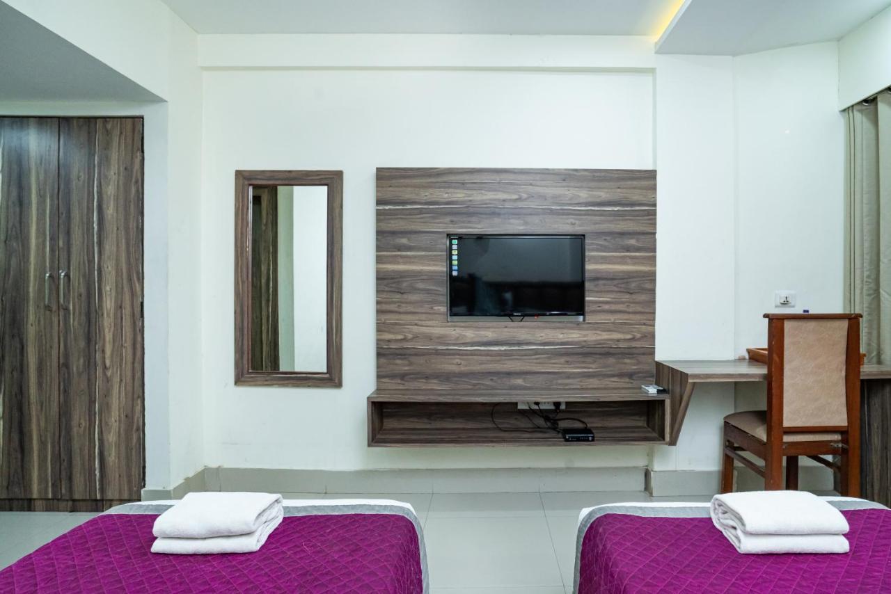 Nexstay Crystal Residency Kozhikode Bagian luar foto