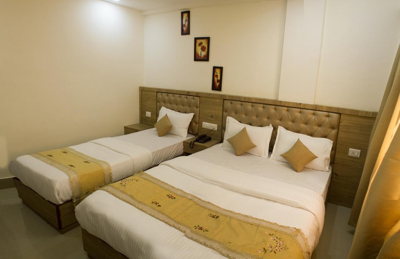 Nexstay Crystal Residency Kozhikode Bagian luar foto