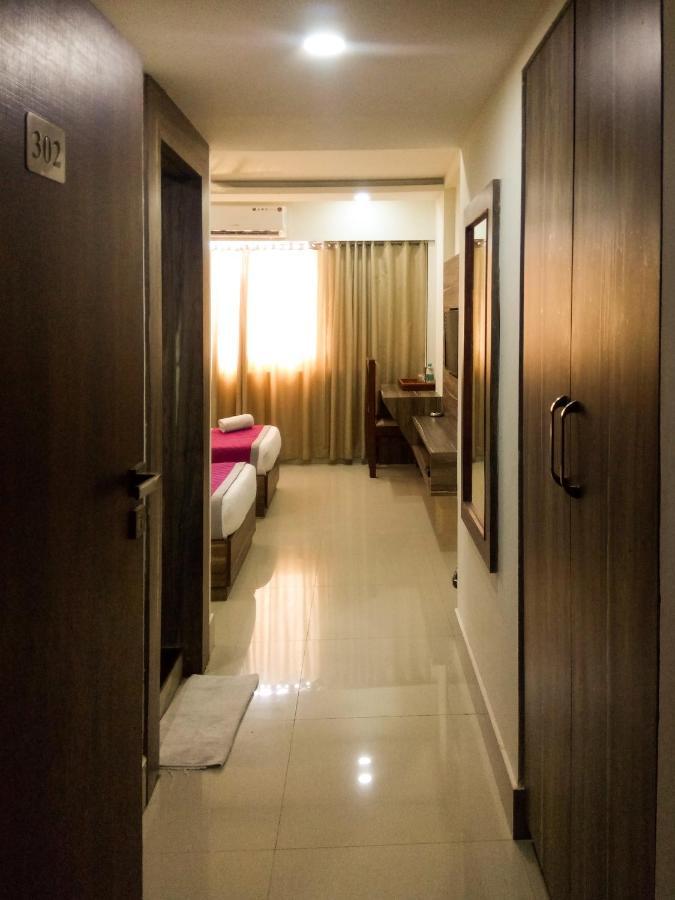 Nexstay Crystal Residency Kozhikode Bagian luar foto