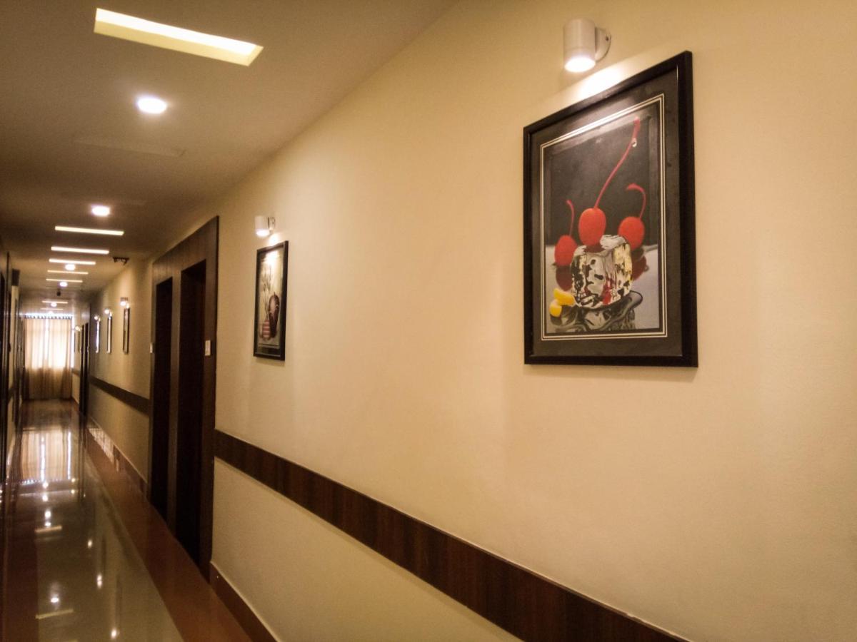 Nexstay Crystal Residency Kozhikode Bagian luar foto