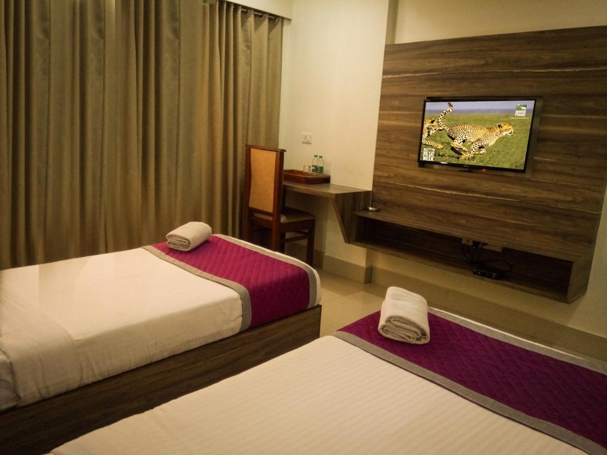 Nexstay Crystal Residency Kozhikode Bagian luar foto